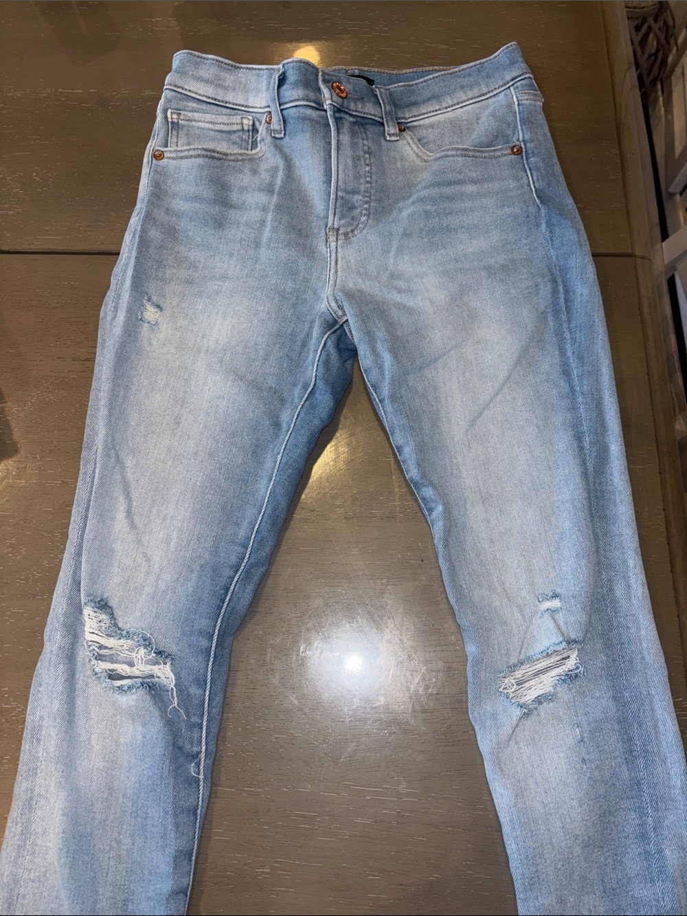Express women’s Light Blue Skinny Jeans with Knee Rips